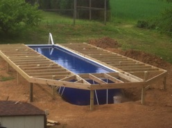 Assembled pool and started finishing deck supports